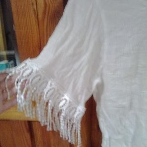 FLAWLESS Gorgeous white top with tassel sleeves